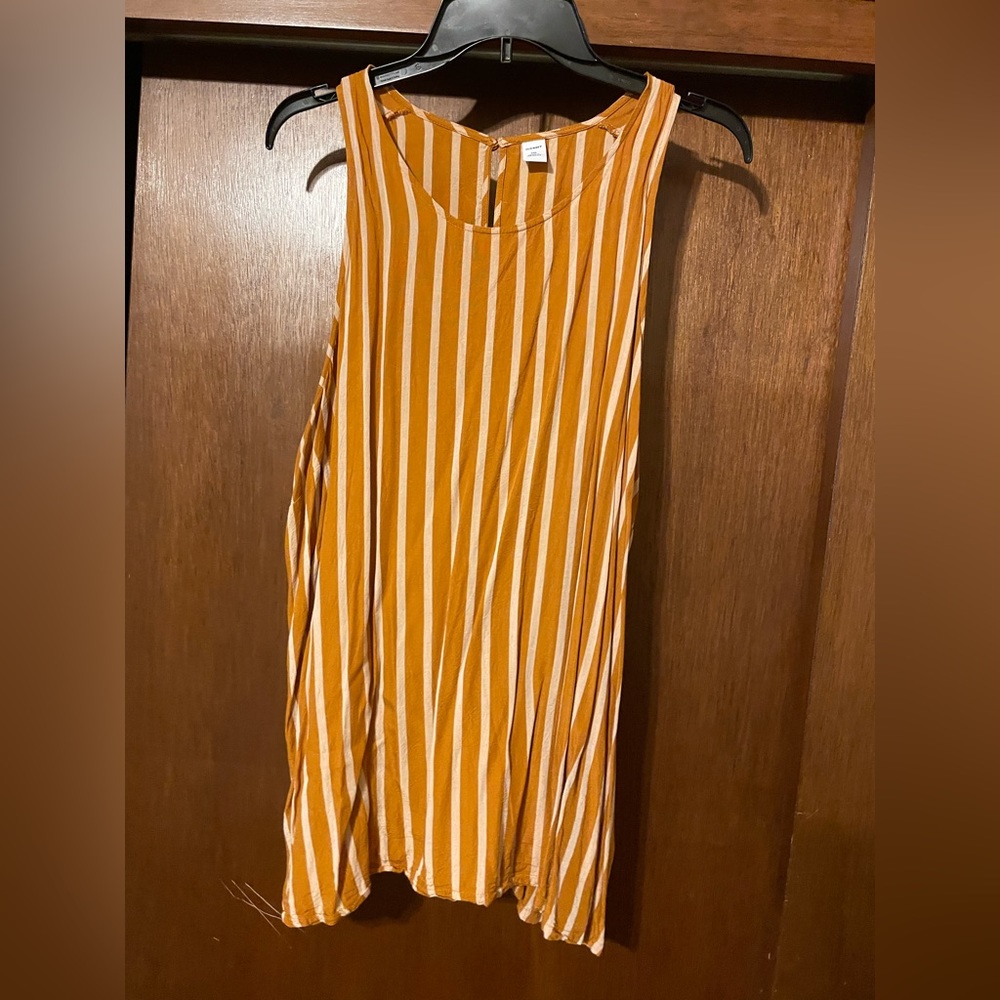 Orange and white vertical striped tank